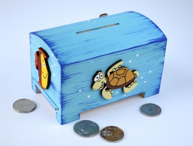 Pokladnička s lachtanem a slonem