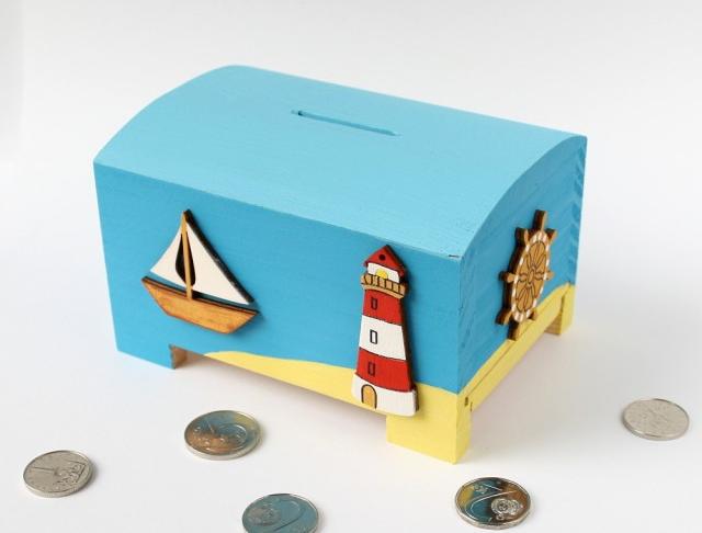 Pokladnička s lachtanem a slonem