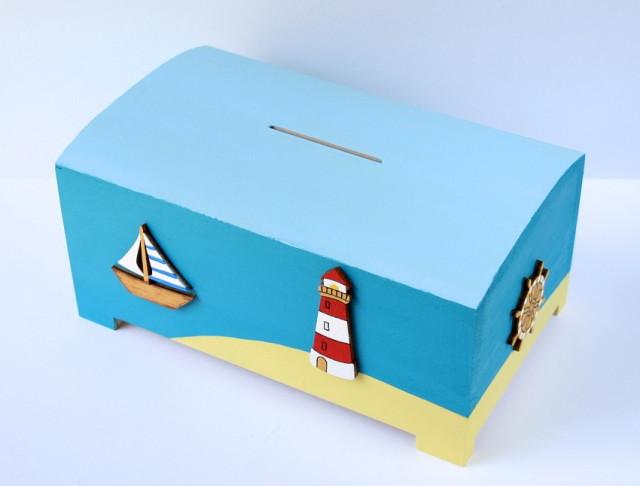 Pokladnička s lachtanem a slonem