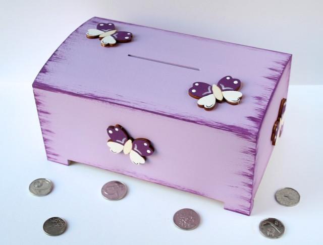 Pokladnička s lachtanem a slonem