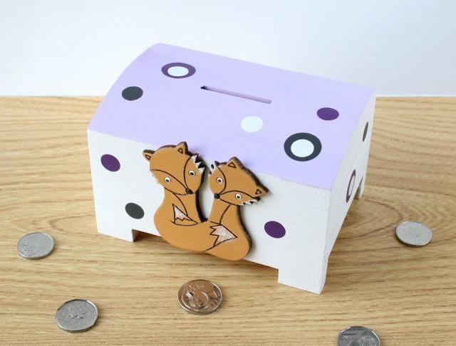 Pokladnička s lachtanem a slonem