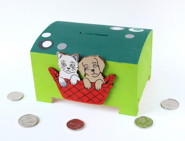 Pokladnička s lachtanem a slonem