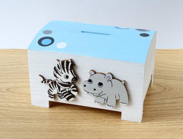 Pokladnička s lachtanem a slonem