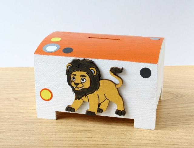 Pokladnička s lachtanem a slonem