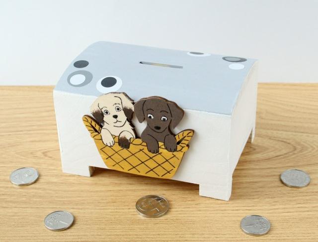 Pokladnička s lachtanem a slonem