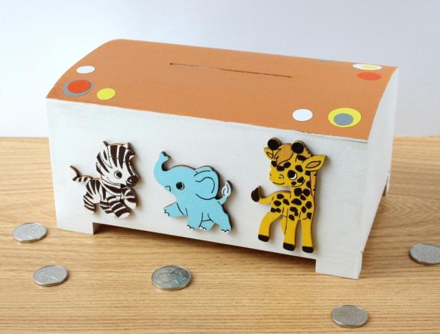 Pokladnička s lachtanem a slonem